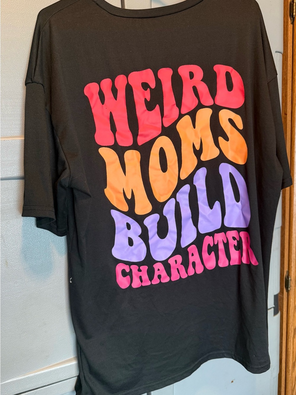 Black Short-Sleeve Graphic Tee with Bright Retro Slogan